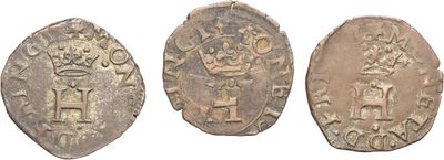 three ancient coins, one of which has a crown and one of which has a cross on it