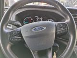 a close up of a steering wheel in a car