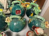 many different vases that are sitting on a table