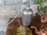 a teapot and a tea kettle on a wooden table