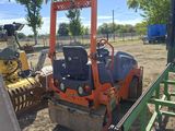 a picture of a construction vehicle parked in a field