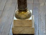 a vase that is sitting on top of a wooden table