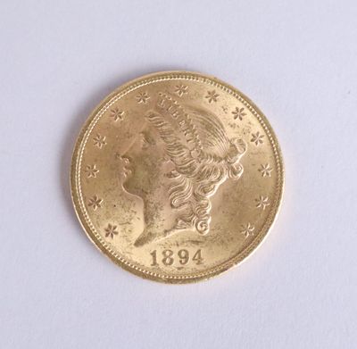 an image of a close up of a coin on a white surface