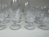 a lot of empty wine glasses sitting on a table