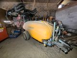 a yellow machine that is parked in a garage