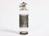 a small glass bottle with a silver lid and a silver lid