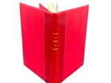 a red book that has a red cover on it