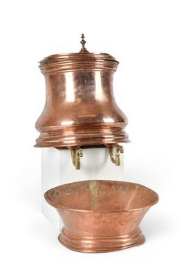 an old copper pot and a bowl on a white background
