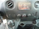 a car dashboard with many buttons and controls