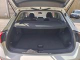 the back of a car with the trunk open and the seats down