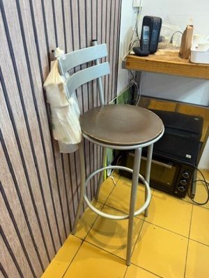 a chair and a table in a small room