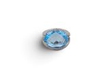 an oval blue topaze and diamond ring on a white background