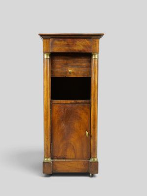 a small wooden cabinet with a drawer on top of it