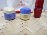 three different types of skin care products sitting on a table