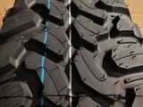 a close up of a tire with a blue stripe on it