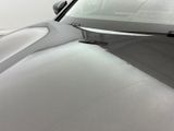 a close up of a car with a windshield covered in snow