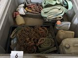 a cooler filled with assorted items sitting on the floor