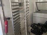 an image of a commercial kitchen with a rack of food