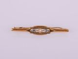 une broche en or et diamants