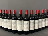 a group of bottles of wine sitting on top of a table
