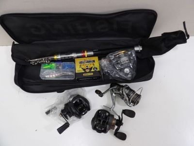 a bag with a fishing rod, reels, and other items in it