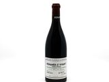 a bottle of wine that is sitting on a table
