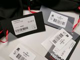 a picture of a group of luggage tags on a table