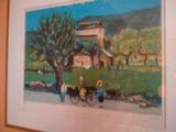 a picture of a painting hanging on the wall of a house