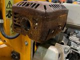 a machine that is sitting on a pallet in a warehouse