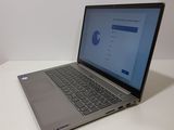 a laptop that is sitting on a white table
