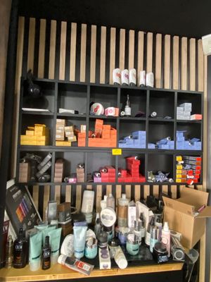 a room with a lot of items on the shelves
