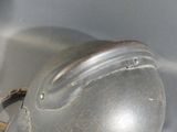a helmet that is sitting in a metal container