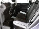 the back seats of a car are empty and the passenger seat is empty