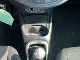 a picture of a car dashboard with a car key in it