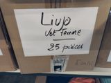 a sign on the shelf of a store that says livp out of home