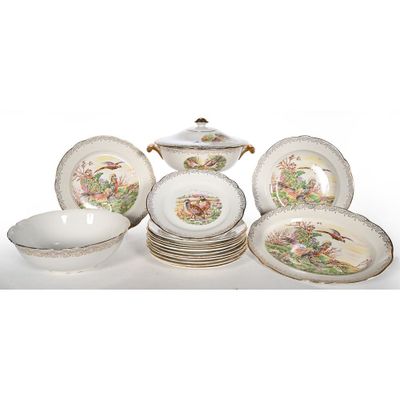 une photo représentant un ensemble d'assiettes et de tasses en porcelaine