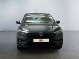 the front view of a black car in a white room