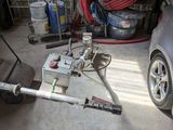 an image of a car being worked on in a garage