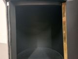 a black shelf that has a black shelf in it