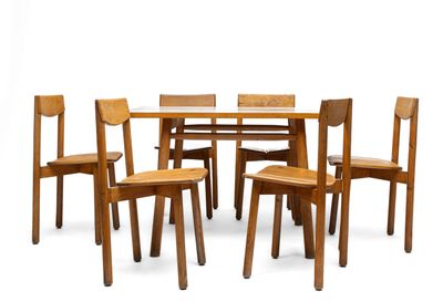 dining table with six chairs and a glass top