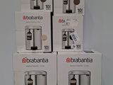 four boxes of appliances are stacked on top of each other