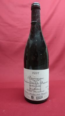 a bottle of wine that is sitting on a table