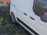 a white van that is parked in front of a house