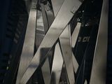 a lot of knives that are sitting in a blue container