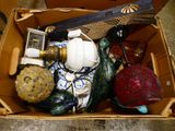 a box full of assorted items sitting on the floor
