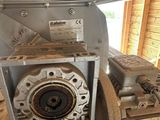 a machine that is sitting inside of a building