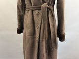 an image of a brown coat with a fur collar
