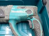 a cordless drill that is sitting in a tool box