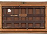 an old wooden window with a wooden frame and a wooden handle