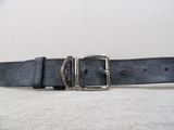 black leather belt with a silver buckle on a white background